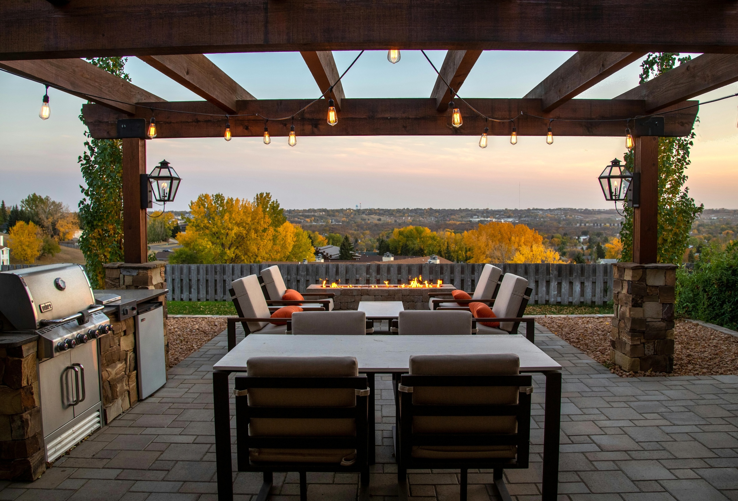 Patios You Can Use Every Season Cozy patio with scenic sunset view.
