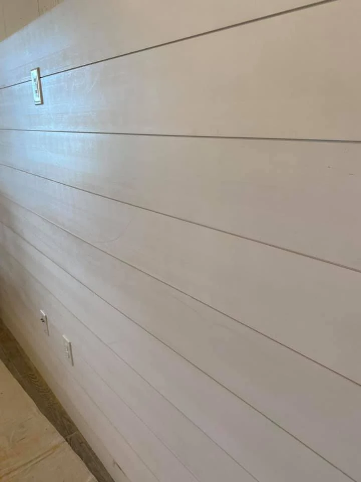 Plain white wooden wall paneling