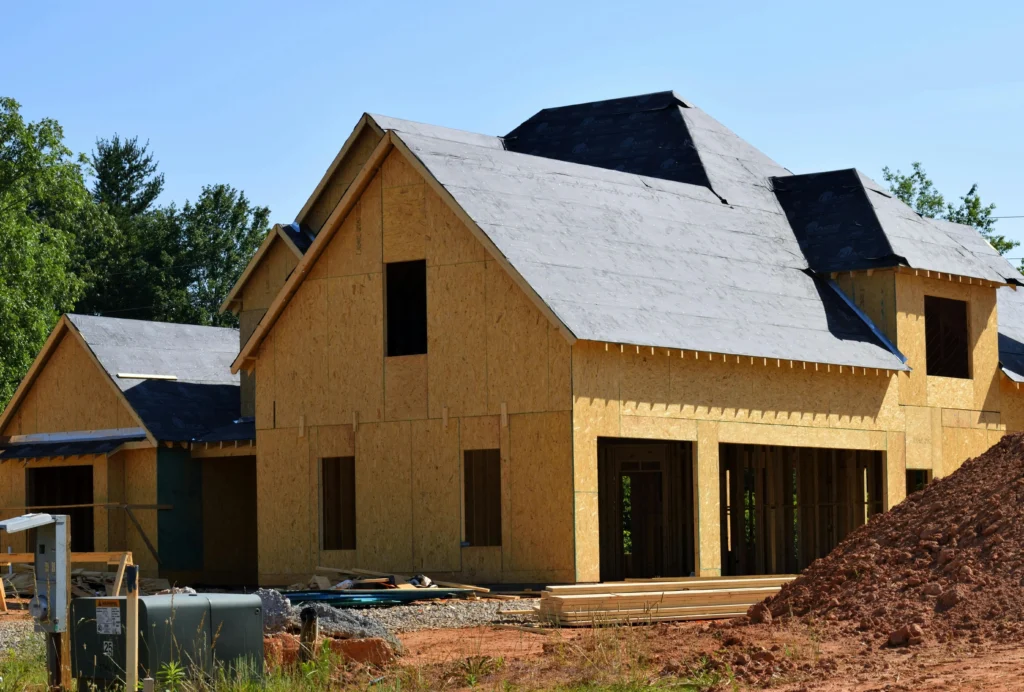 New home under construction with materials